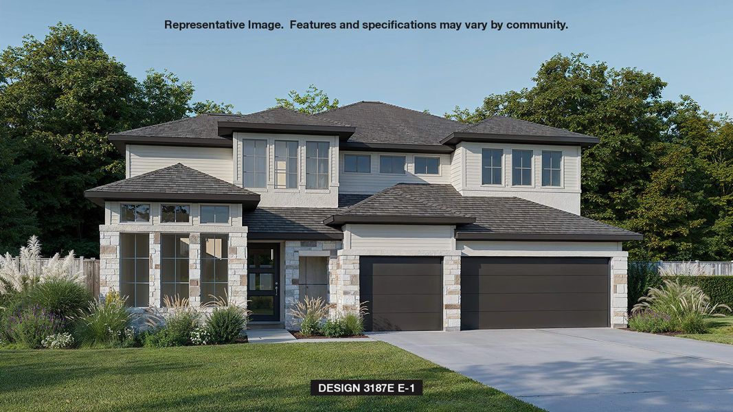 View of front of home with concrete driveway, stone siding, and a garage