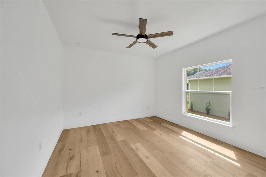 Spacious, unfurnished interior of a new home in , Dade City (Image 44).