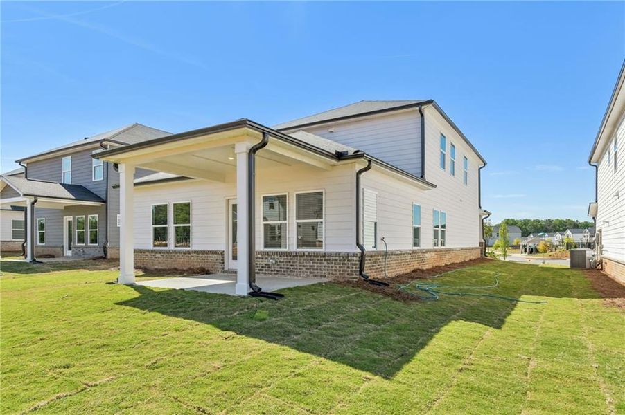 Exterior details and patio area of a home in Martin Springs - Reserve Series, Lawrenceville (Image 30).