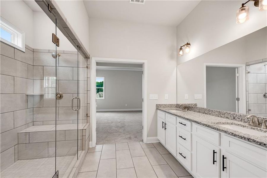 Furnished interior view inside a new home in Hidden Fields, Hoschton (Image 8).