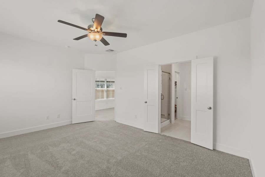 Representative unfurnished interior of a home built from the Chalet by Chesmar Homes in Meridiana Townhomes, Iowa Colony (Image 35).