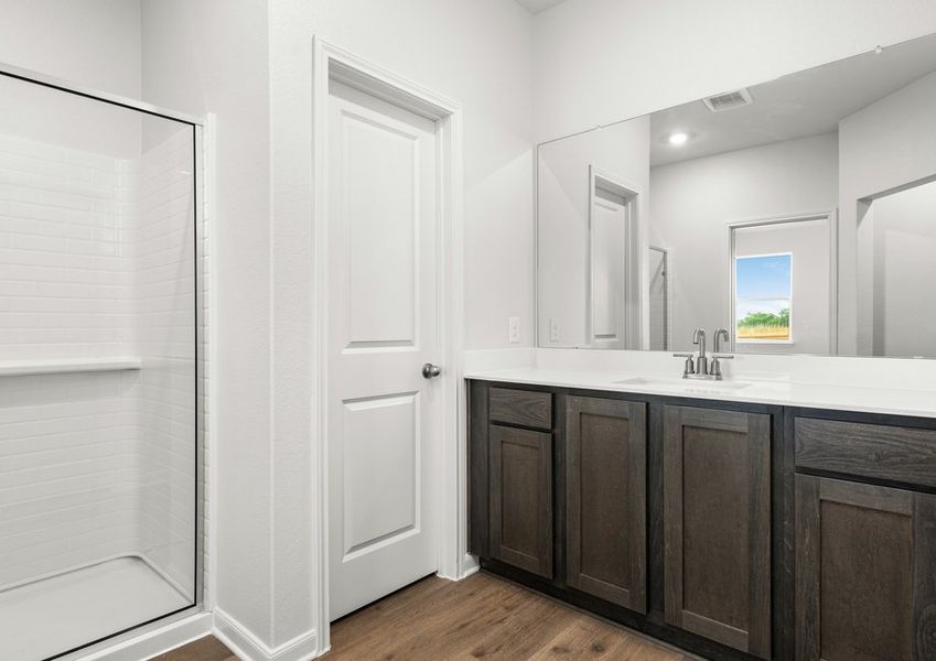 The master bathroom has a large vanity space. The master bathroom has a large vanity space.