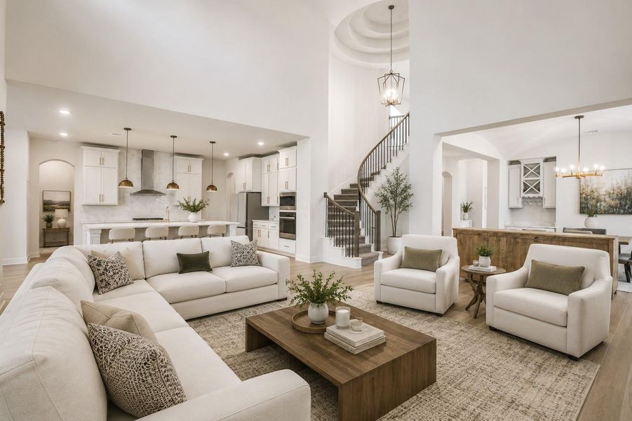 This spacious living area features high ceilings, a modern open floor plan, and abundant natural light. It includes a sleek kitchen and a striking spiral staircase as a focal point. This spacious living area features high ceilings, a modern open floor plan, and abundant natural light. It includes a sleek kitchen and a striking spiral staircase as a focal point.