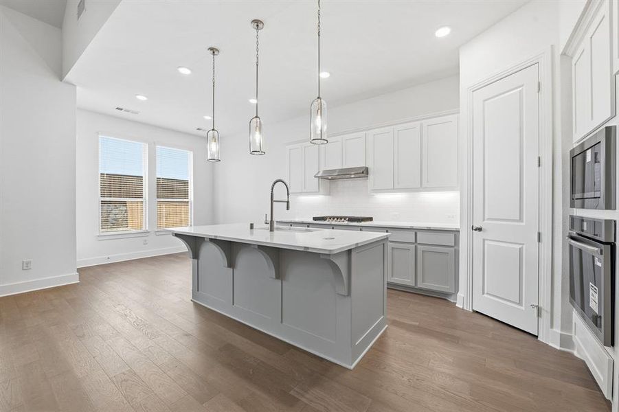 Furnished interior view inside a new home in Wildridge, Oak Point (Image 6).