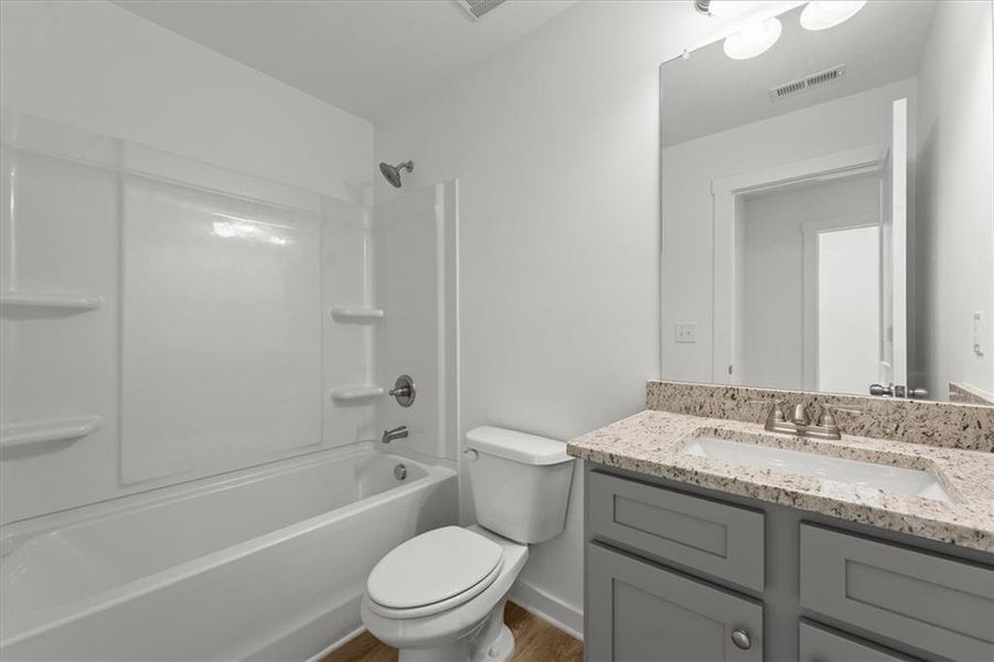 Furnished interior view inside a new home in Ellington Farms, Statham (Image 11).