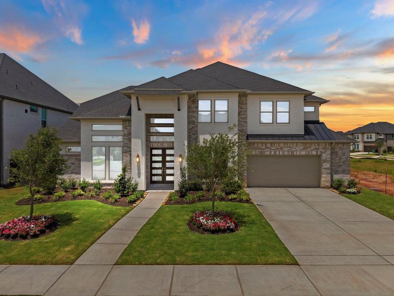Front exterior of a new home in Harvest Green, Richmond, TX, highlighting curb appeal (Image 1). Front exterior of a new home in Harvest Green, Richmond, TX, highlighting curb appeal (Image 1).