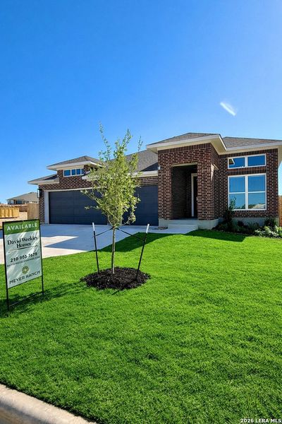 Front exterior of a new home in , New Braunfels, TX, highlighting curb appeal (Image 1). Front exterior of a new home in , New Braunfels, TX, highlighting curb appeal (Image 1).