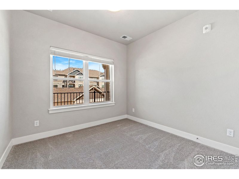 Spacious, unfurnished interior of a new home in The Lakes at Centerra - North Shore Flats, Loveland (Image 8).