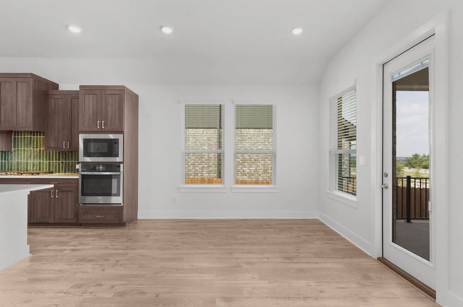 Representative furnished interior of a home built from the Mariah by Chesmar Homes in University Heights, McKinney (Image 10).
