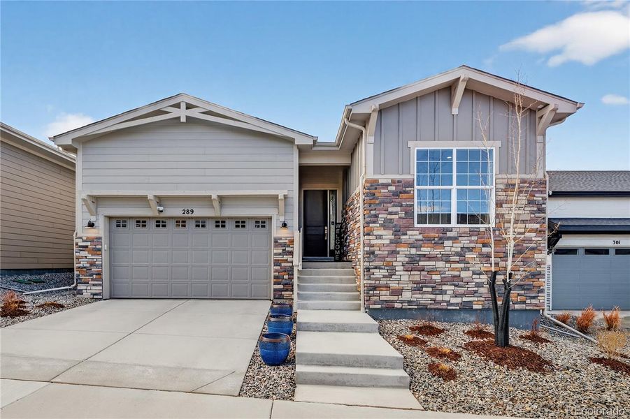 Front exterior of a new home in , Castle Rock, CO, highlighting curb appeal (Image 1). Front exterior of a new home in , Castle Rock, CO, highlighting curb appeal (Image 1).