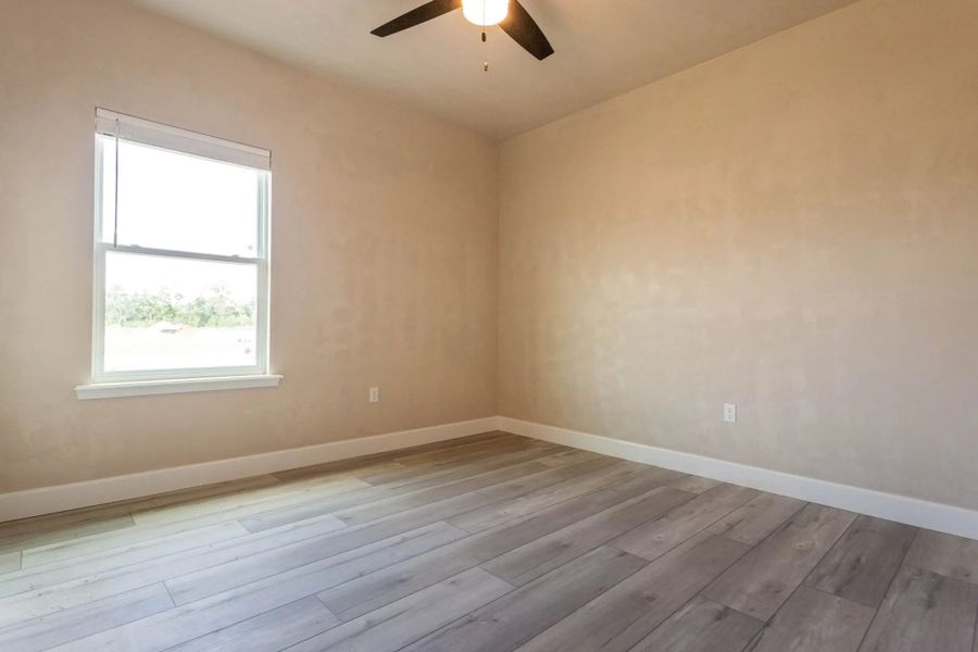 Representative unfurnished interior of a home built from the Bellah by William Weseman Construction in Grand Oaks, Gainesville (Image 9).