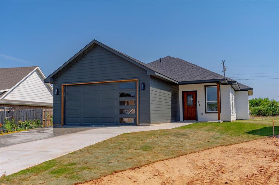 View of front facade with a garage