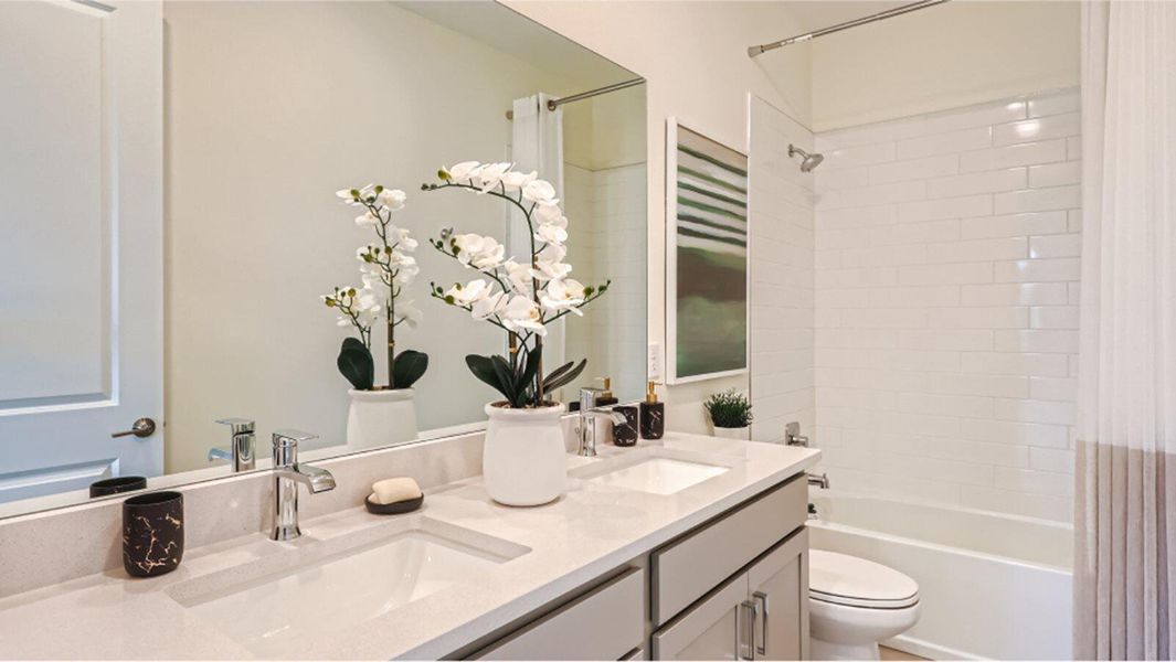 Furnished interior view inside a new home in Tesoro Club, Port St. Lucie (Image 22).