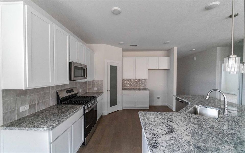 Furnished interior view inside a new home in Pebblebrook, Sherman (Image 2).