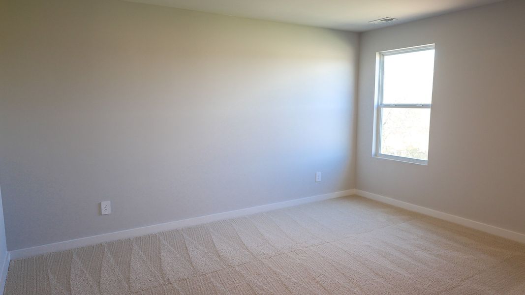 Representative unfurnished interior of a home built from the STONEBROOK II by D.R. Horton in Harvest Point, Spring Hill (Image 55).