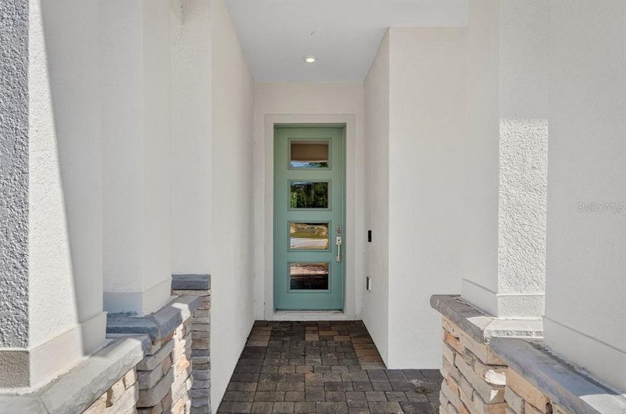 Exterior details and patio area of a home in Gray Hawk at Hole Two, Daytona Beach (Image 30).