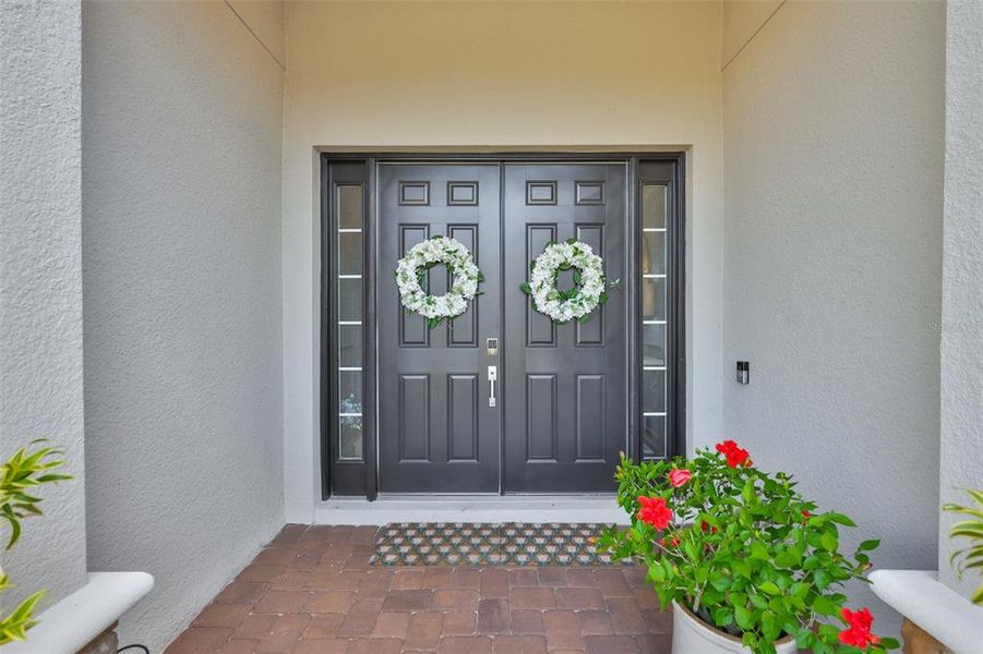 Exterior details and patio area of a home in Esplanade at Artisan Lakes, Palmetto (Image 3).