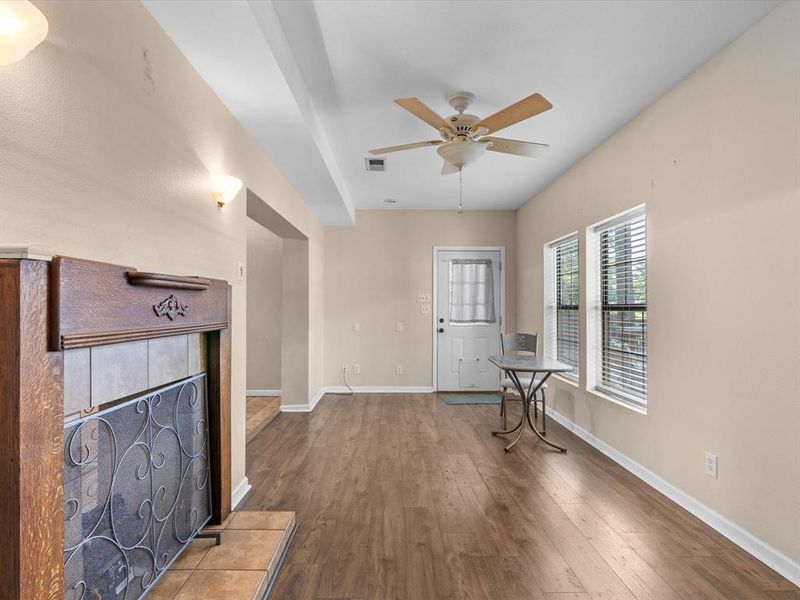 Foyer featuring ceiling fan and wood finished floors Foyer featuring ceiling fan and wood finished floors
