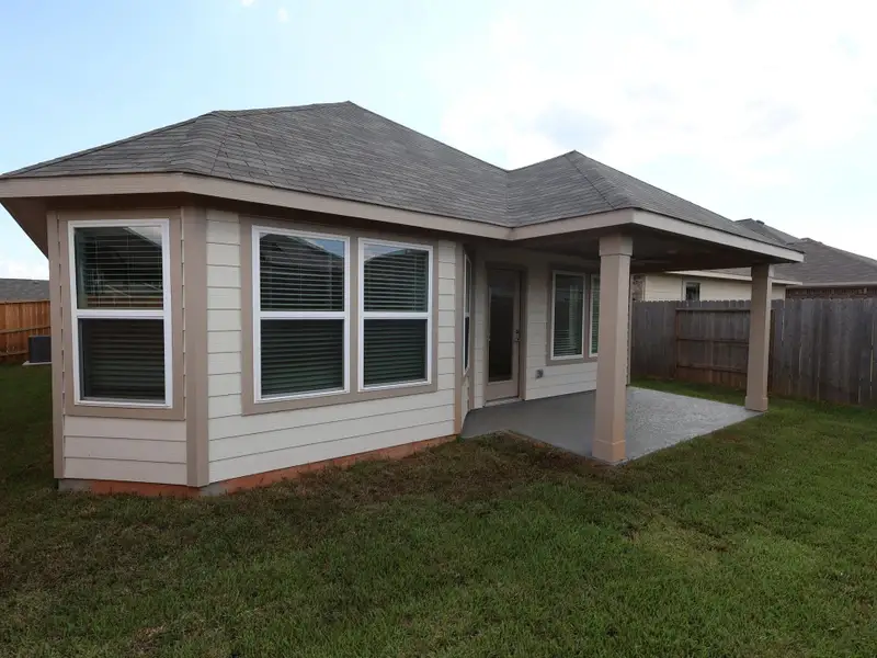 Exterior details and patio area of a home in Moran Ranch, Willis (Image 4). Exterior details and patio area of a home in Moran Ranch, Willis (Image 4).