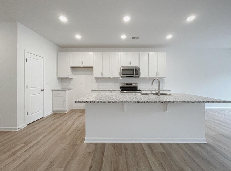 Furnished interior view inside a new home in East Main Townes, Spartanburg (Image 7).