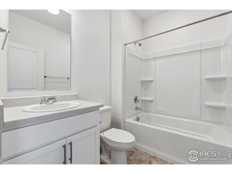 Furnished interior view inside a new home in Silver Peaks, Lochbuie (Image 6).