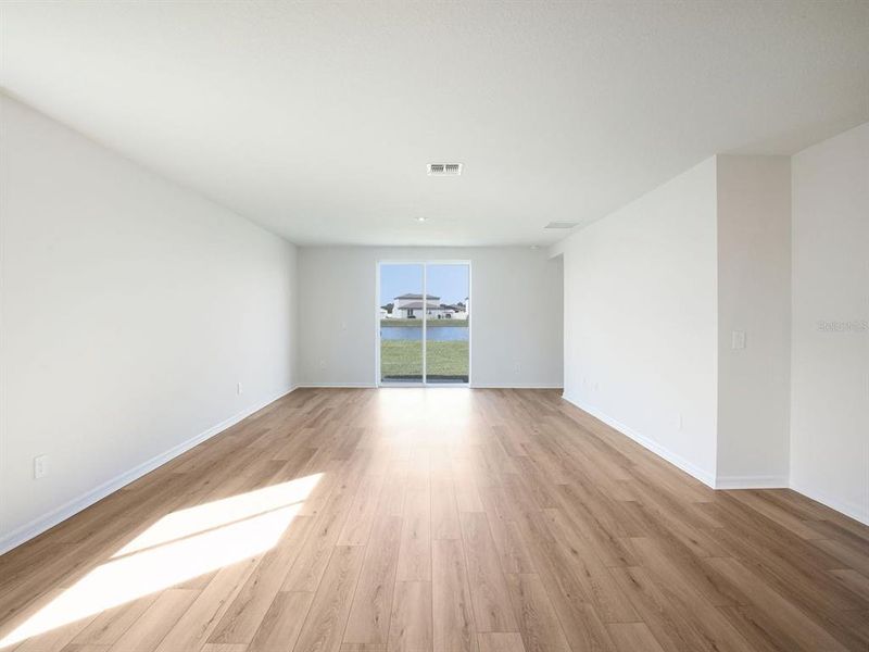 Spacious, unfurnished interior of a new home in The Grove at Stuart Crossing - Classic Series, Bartow (Image 18).