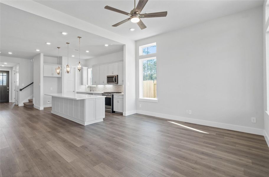 Whether you are relaxing in the great room or greeting guests at the front door, the open sightlines ensure that everyone feels connected, fostering a truly inclusive living experience where isolation is a thing of the past.