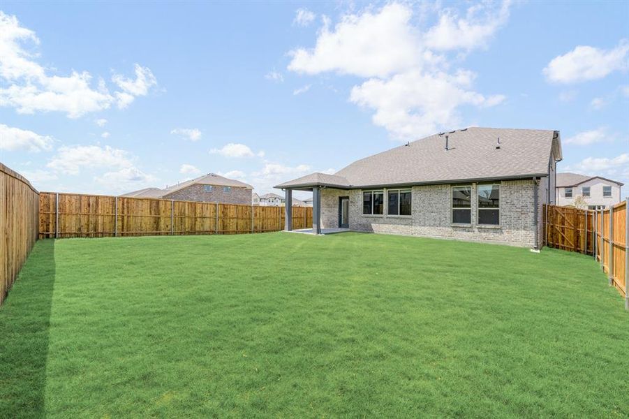 Exterior details and patio area of a home in ArrowBrooke Elements, Aubrey (Image 4). Exterior details and patio area of a home in ArrowBrooke Elements, Aubrey (Image 4).