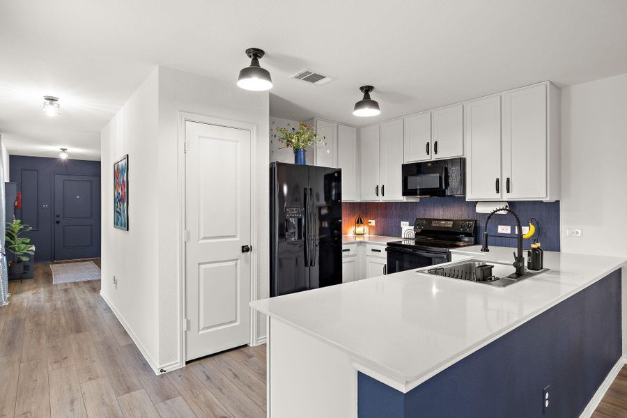 Breakfast bar provides additional seating for casual dining. Breakfast bar provides additional seating for casual dining.