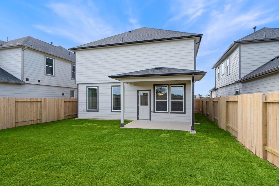 Exterior details and patio area of a home in Grand Oaks Village, Houston (Image 15). Exterior details and patio area of a home in Grand Oaks Village, Houston (Image 15).