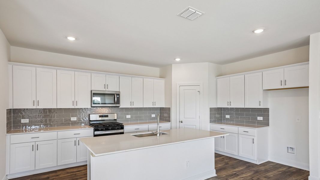 Furnished interior view inside a new home in Railhead, Cedar Creek (Image 4).