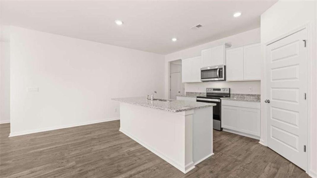 Furnished interior view inside a new home in Oakchase at Hampton, Hampton (Image 13).