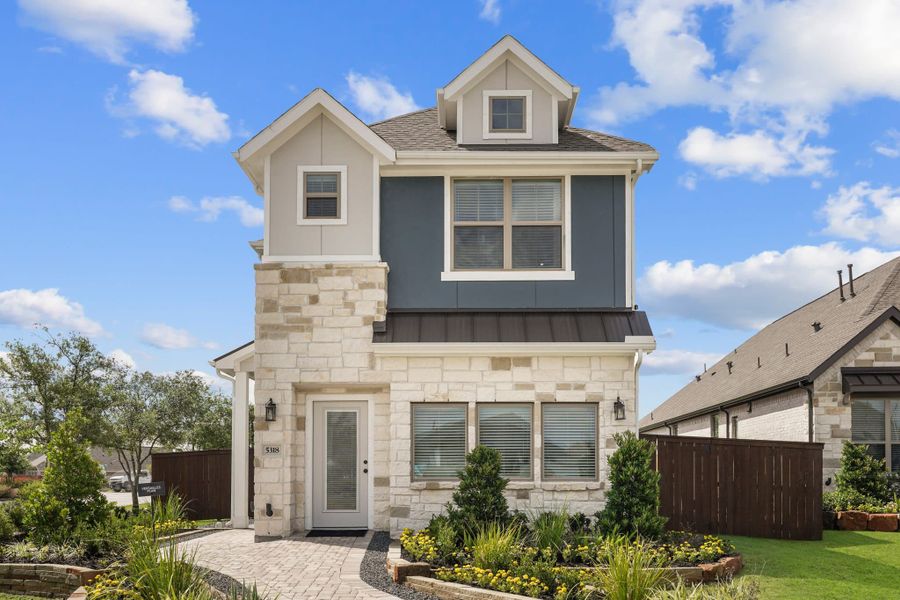 Front exterior of a new home in Bridgeland, Cypress, TX, highlighting curb appeal (Image 22).