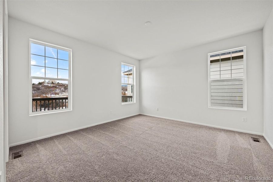 Spacious, unfurnished interior of a new home in Terrain Oak Valley, Castle Rock (Image 9).