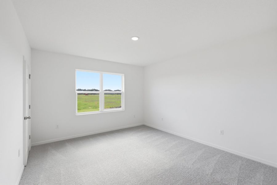 Spacious, unfurnished interior of a new home in Highfield at Twisted Oaks, Wildwood (Image 16).