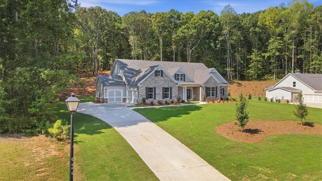 Front exterior of a new home in , Monroe, GA, highlighting curb appeal (Image 31).