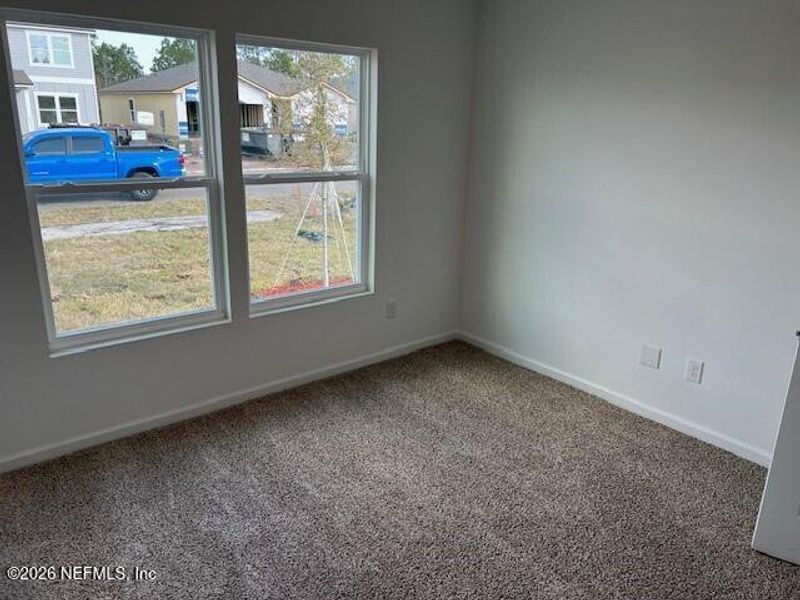 Spacious, unfurnished interior of a new home in Sawmill Branch, Palm Coast (Image 19).