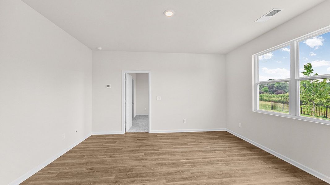 Representative unfurnished interior of a home built from the Edgewood Express - Duplex by D.R. Horton in Remington Chase, Perry (Image 14).