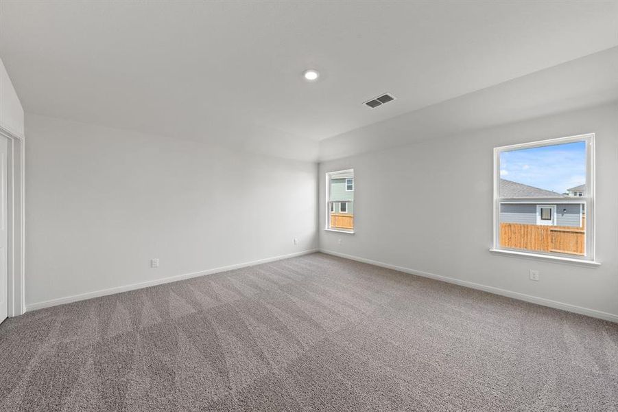 Unfurnished room with carpet flooring and recessed lighting