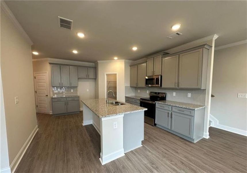 Furnished interior view inside a new home in Mulberry Summit, Flowery Branch (Image 7).