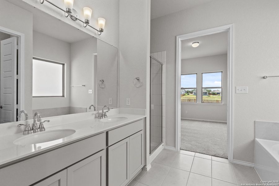 Furnished interior view inside a new home in Megan's Landing, Castroville (Image 13).