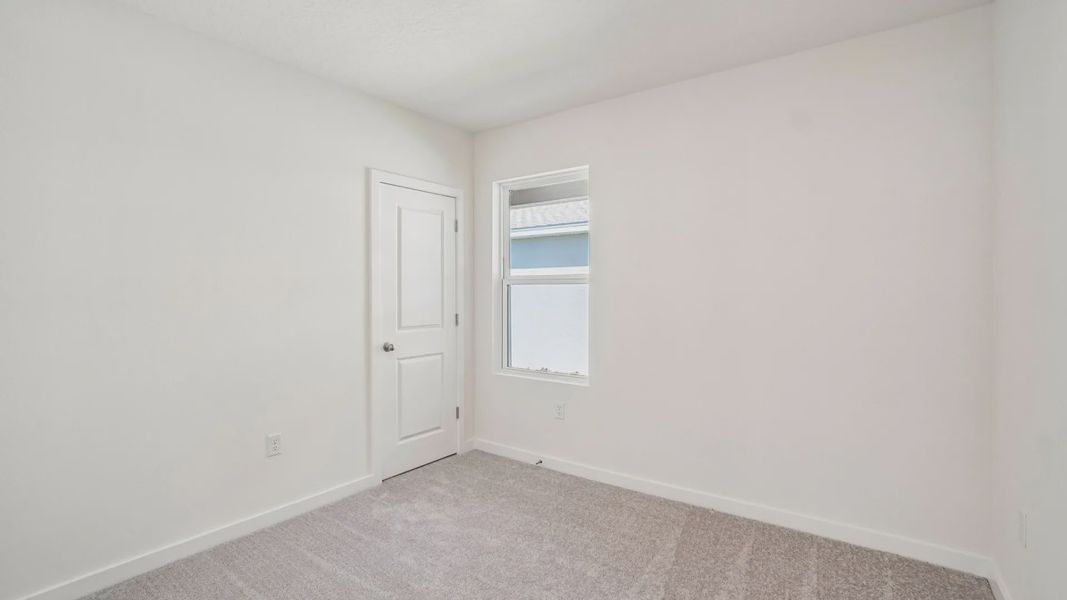 Furnished interior view inside a new home in Willowbrook North, Winter Haven (Image 35).