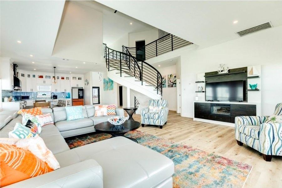 Bright and airy open living area with pops of color