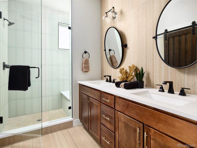 Primary bath w/dual vanity, enclosed water closet, shower w/bench Primary bath w/dual vanity, enclosed water closet, shower w/bench