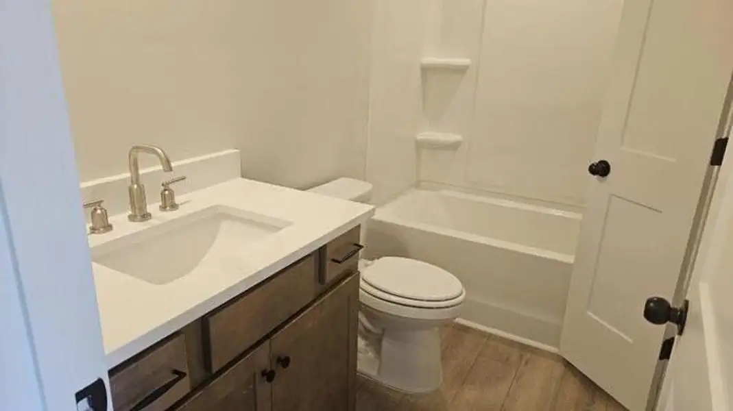 Furnished interior view inside a new home in The Enclave at French Quarter Creek, Huger (Image 4).