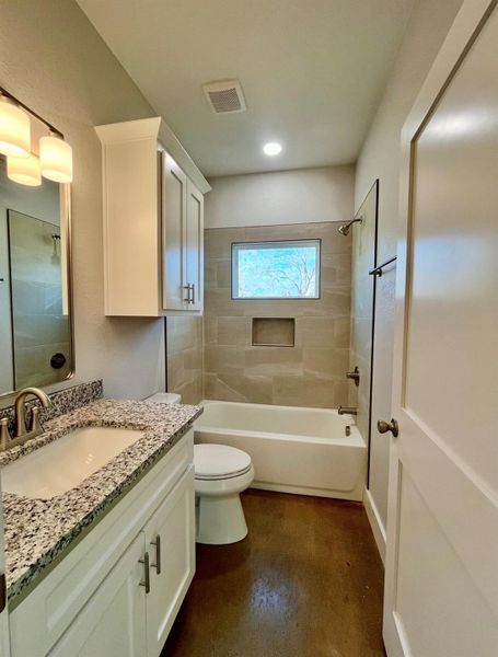 Full bathroom with vanity and bathtub / shower combination
