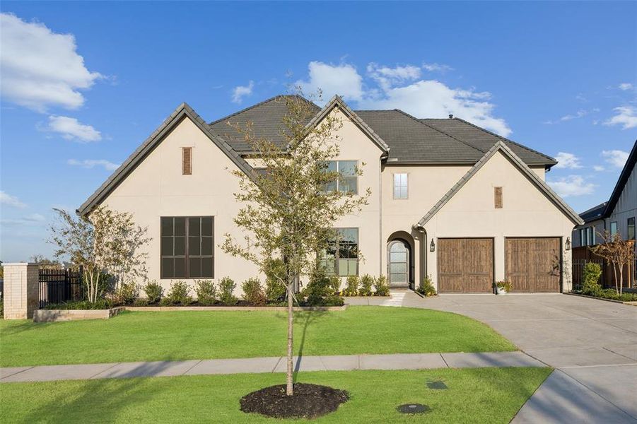 Front exterior of a new home in , Frisco, TX, highlighting curb appeal (Image 2).