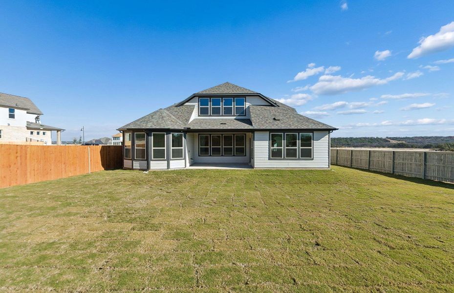 Exterior details and patio area of a home in Saddleback at Santa Rita Ranch, Liberty Hill (Image 3).