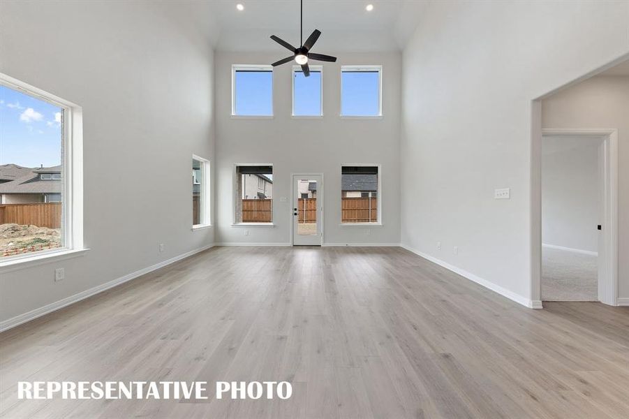 Your spacious new family room is flooded with natural light from a dual stacked wall of windows! REPRESENTATIVE PHOTO Your spacious new family room is flooded with natural light from a dual stacked wall of windows! REPRESENTATIVE PHOTO