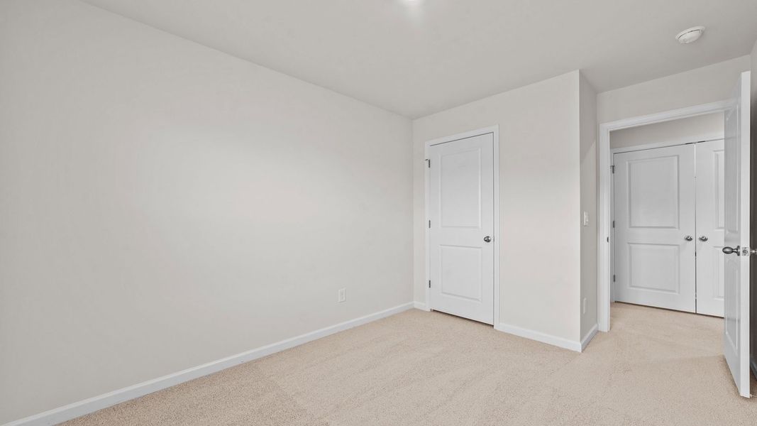 Representative unfurnished interior of a home built from the Pearson by D.R. Horton in The Townes at Carter Ridge, Greenville (Image 13).